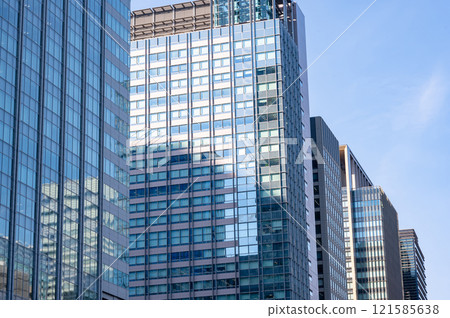 Landscape of the office town looking up at a skyscraper Landscape of the office town looking up at a skyscraper 121585638
