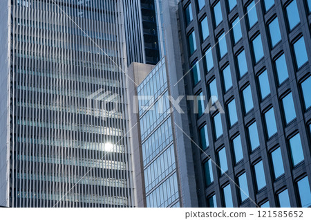 Landscape of the office town looking up at a skyscraper Landscape of the office town looking up at a skyscraper 121585652