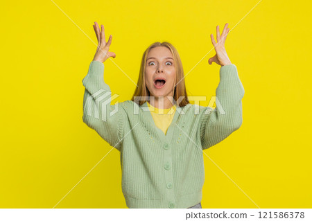 Amazed shocked excited mature woman touching head and showing head explosion looking worried shocked Amazed shocked excited mature woman touching head and showing head explosion looking worried shocked 121586378