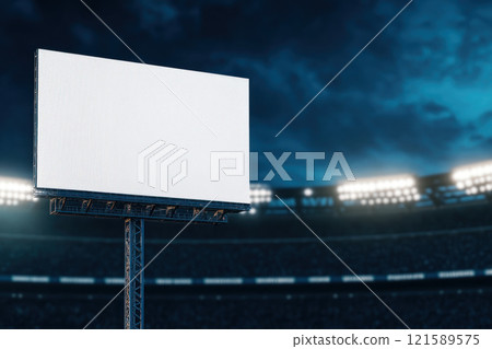 blank billboard stands illuminated in front of stadium, ready for announcements 121589575