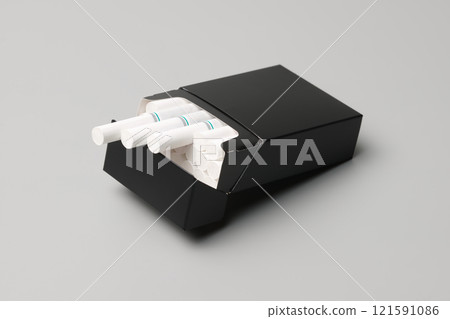 An open black box of cigarettes 121591086