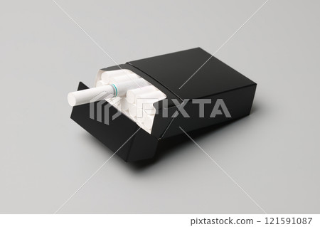 An open black box of cigarettes 121591087