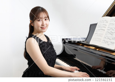 Beautiful Japanese female pianist 121592231