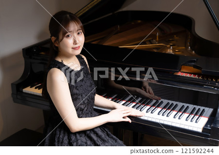 Beautiful Japanese female pianist 121592244