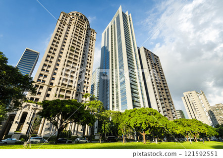 Low-angle view of the modern architectural landscape in Taichung Taiwan. here is near the National Taichung Theater. Low-angle view of the modern architectural landscape in Taichung Taiwan. here is near the National Taichung Theater. 121592551