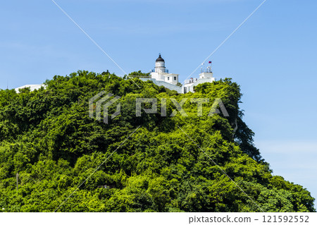 Close-up of the White Lighthouse on the hilltop of Cijin in Kaohsiung, Taiwan. 121592552