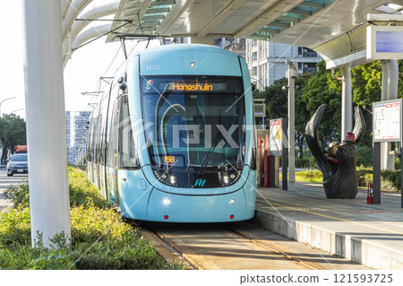 The Danhai Light Rail transit (LRT) train stops at Binhai Yishan Station in New Taipei City, Taiwan. 121593725