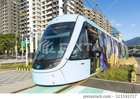 A train traveling on the Danhai Light Rail transit (LRT) in New Taipei City, Taiwan. 121593727