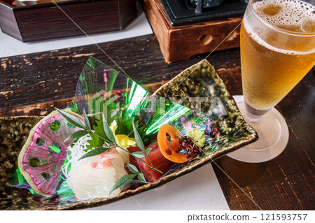 Sashimi and beer Sashimi and beer 121593757