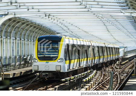 A train traveling on the Circular Line (Yellow Line) metro in New Taipei City, Taiwan, The metro with driverless technology. 121593844