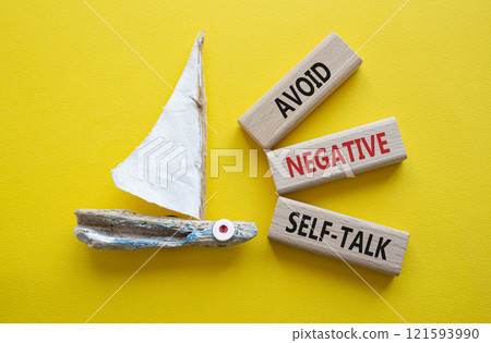 Avoid negative self-talk symbol. Concept words Avoid negative self-talk on wooden blocks. Beautiful yellow background with boat. Business and Avoid negative self-talk concept. Copy space. Avoid negative self-talk symbol. Concept words Avoid negative self-talk on wooden blocks. Beautiful yellow background with boat. Business and Avoid negative self-talk concept. Copy space. 121593990