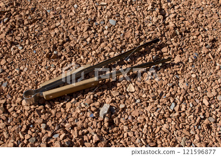 Fire tongs for bonfires Fire tongs for bonfires 121596877
