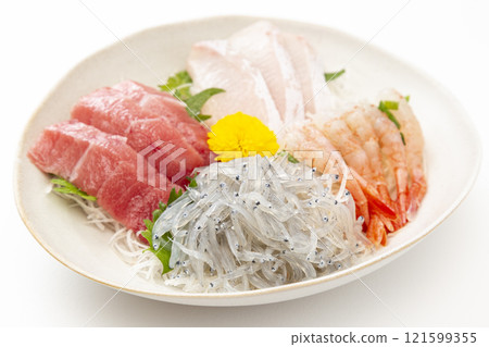 Assorted sashimi on white background 121599355