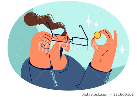 Woman in glasses look at golden coin Woman in glasses look at golden coin 121600161