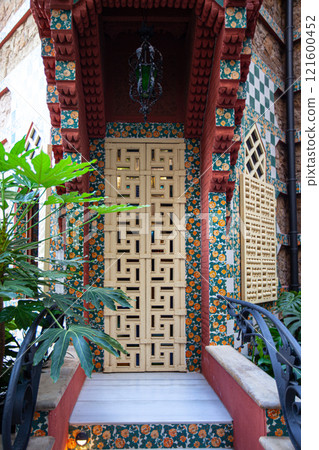 Exploring Casa Vicens by Gaudi in Barcelona, Spain, showcasing vibrant architectural details and unique design elements 121600452