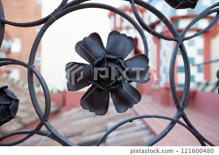 Intricate metalwork detail at Casa Vicens by Gaudi in Barcelona Spain showcases artistic design and craftsmanship in 21st century architecture Intricate metalwork detail at Casa Vicens by Gaudi in Barcelona Spain showcases artistic design and craftsmanship in 21st century architecture 121600480