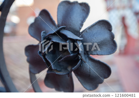 Black metallic flower detail at Casa Vicens by Gaudi in Barcelona, Spain showcases unique craftsmanship and artistic design elements Black metallic flower detail at Casa Vicens by Gaudi in Barcelona, Spain showcases unique craftsmanship and artistic design elements 121600481