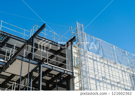 Blue sky and steel frame construction Blue sky and steel frame construction 121602362