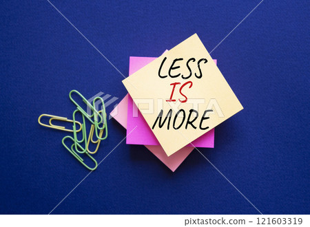 Less is More symbol. Steaky Notes with Concept words Less is More. Beautiful deep blue background. Business and Less is More concept. Copy space. Less is More symbol. Steaky Notes with Concept words Less is More. Beautiful deep blue background. Business and Less is More concept. Copy space. 121603319