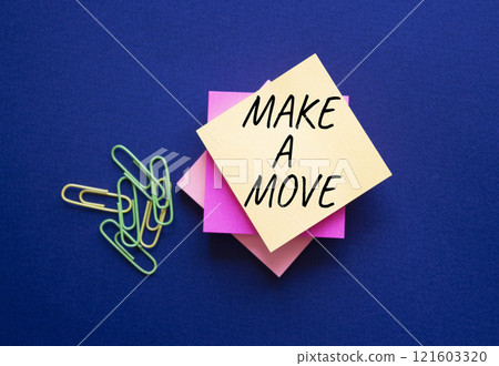 Make a Move symbol. Steaky Notes with Concept words Make a Move. Beautiful deep blue background. Business and Make a Move concept. Copy space. 121603320