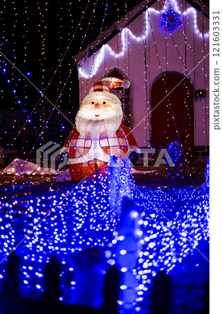 Santa Claus enjoying Christmas illuminations 121603331