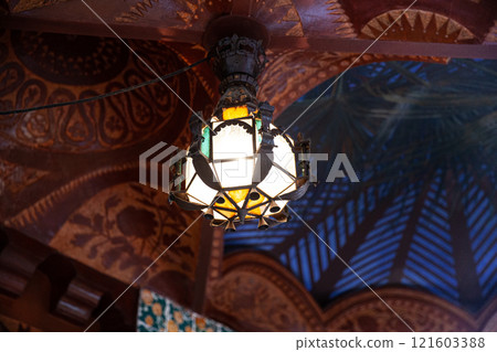 Exquisite interior light fixture at Casa Vicens Gaudi 121603388