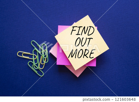 Find out more symbol. Steaky Notes Blackboard with words Find out more. Beautiful deep blue background. Business and Find out more concept. Copy space. 121603648