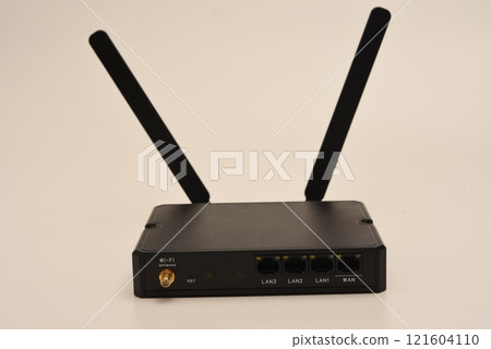 GSM modem. An Internet station with a SIM card. A black router on a white background. GSM modem. An Internet station with a SIM card. A black router on a white background. 121604110