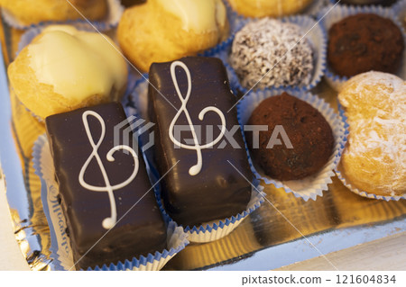 Wonderful typical Italian pastries mix in a tray close-up 121604834