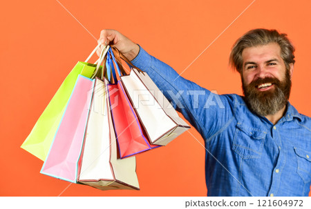 Seasonal sale. Hipster buying sale price. Black Friday. Cyber monday sale. Boost sales. Profitable deals. Retail concept. Happy holidays. Handsome buyer. Free shipping. Bearded man hold shopping bags Seasonal sale. Hipster buying sale price. Black Friday. Cyber monday sale. Boost sales. Profitable deals. Retail concept. Happy holidays. Handsome buyer. Free shipping. Bearded man hold shopping bags 121604972
