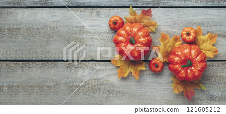 Orange pumpkin. Autumn composition. Autumn, fall, halloween, thanksgiving concept. Flat lay, top view, copy space Orange pumpkin. Autumn composition. Autumn, fall, halloween, thanksgiving concept. Flat lay, top view, copy space 121605212