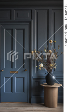 Blank light switch mockup set against a dark blue wall with a stylish vase and door 121605510