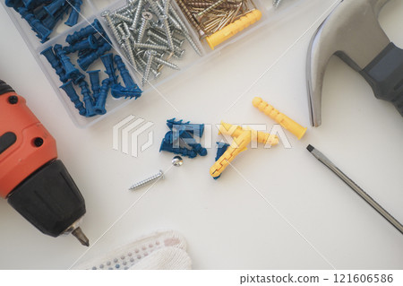 Important Tools and Various Fasteners Essential for DIY Home Projects 121606586