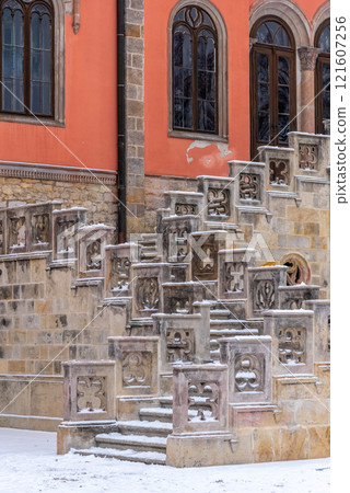 Close-up view of old ornamental castle staircase in Sychrov Castle in winter time. Czech Republic. Close-up view of old ornamental castle staircase in Sychrov Castle in winter time. Czech Republic. 121607256