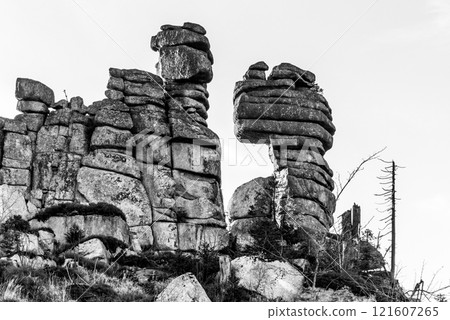 Unique eroded granite rock formation on the top of Tristolicnik, Dreisesselberg. Sumava National Park and Bavarian Forest, Czech republic and Germany. Black and white image. Unique eroded granite rock formation on the top of Tristolicnik, Dreisesselberg. Sumava National Park and Bavarian Forest, Czech republic and Germany. Black and white image. 121607265