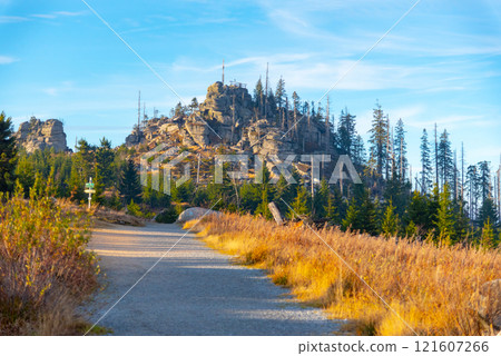 Granite rock formation with wooden cross on the top of Hochstein near Dreisesselberg, Tristolicnik. Border between Bayerische Wald in Germany and Sumava National Park in Czech Republic. 121607266
