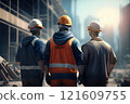 back view group of engineer, technician and architect with safety helmet planning about building plan with blueprint in modern city building background, construction site, industry and worker concept 121609755