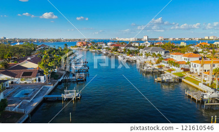 Coastal Waterfront Homes in Florida with Yachts and Palm Trees Coastal Waterfront Homes in Florida with Yachts and Palm Trees 121610546