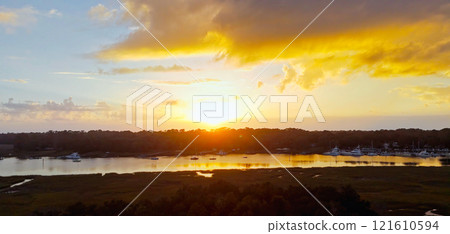 Beautiful sunset view over Isle of Hope at Savannah Georgia - aerial view Beautiful sunset view over Isle of Hope at Savannah Georgia - aerial view 121610594