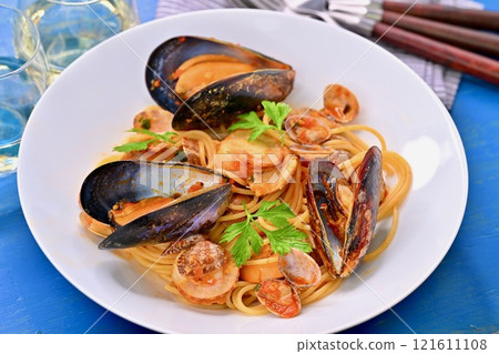 Italian, Pescatore, mussels, clams and scallops in tomato sauce pasta, Pescatore. 121611108