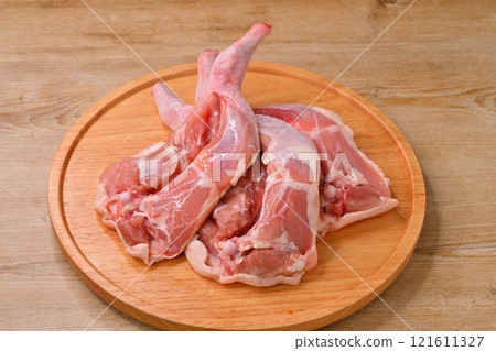 Note: This is raw, uncooked meat. Christmas roast chicken, chicken thighs and thighs on the bone for roast legs 121611327