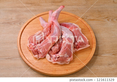 Note: This is raw, uncooked meat. Christmas roast chicken, chicken thighs and thighs on the bone for roast legs 121611329