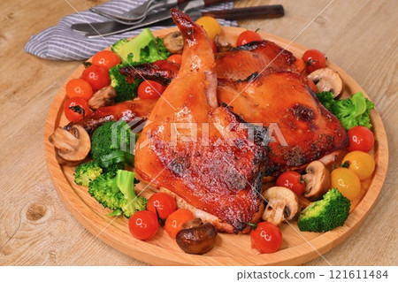 Homemade roast chicken for Christmas, roast legs, Christmas chicken, and teriyaki chicken thighs on the bone. Homemade roast chicken for Christmas, roast legs, Christmas chicken, and teriyaki chicken thighs on the bone. 121611484