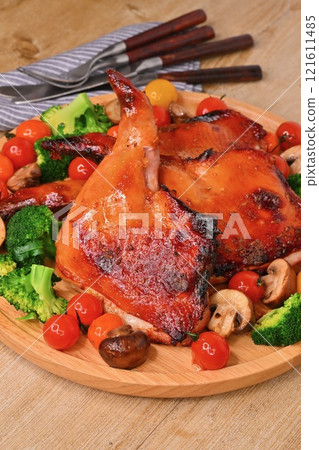 Homemade roast chicken for Christmas, roast legs, Christmas chicken, and teriyaki chicken thighs on the bone. Homemade roast chicken for Christmas, roast legs, Christmas chicken, and teriyaki chicken thighs on the bone. 121611485