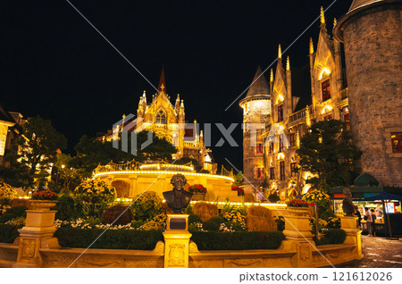 Catholic Cathedral in central square of medieval city in Ba Na Hills Park in Da Nang in Vietnam at night 121612026