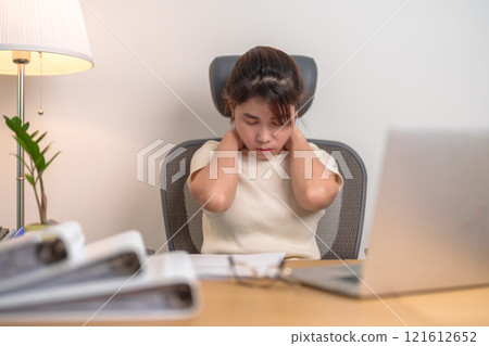 Woman having Neck and Shoulder pain during work long time on workplace. due to fibromyalgia, rheumatism, Scapular pain, office syndrome and ergonomic concept Woman having Neck and Shoulder pain during work long time on workplace. due to fibromyalgia, rheumatism, Scapular pain, office syndrome and ergonomic concept 121612652