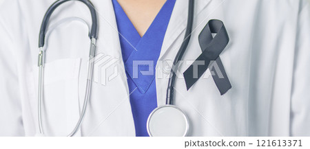 Melanoma and skin cancer, Vaccine injury awareness month and rest in peace concepts. doctor holding black Ribbon 121613371