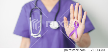 Doctor holding purple Ribbon for Violence, Pancreatic, Esophageal, Testicular cancer, Alzheimer, epilepsy, lupus, Sarcoidosis and Fibromyalgia. Awareness month and World cancer day concept 121613381