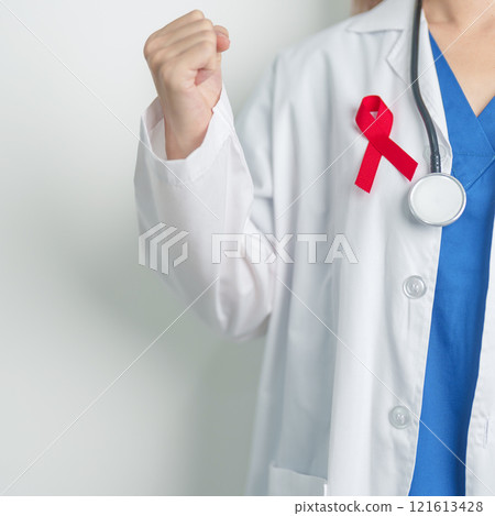 Doctor with Red Ribbon for December World Aids Day, acquired immune deficiency syndrome, multiple myeloma Cancer Awareness month and National Red ribbon week. Healthcare and world cancer day concept 121613428