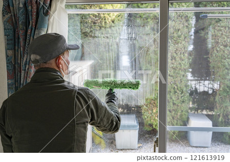Glass cleaning by a specialist Glass cleaning by a specialist 121613919
